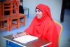 A student reacting to questions from the panelists, at Amoud University School of Postgraduate Studies and Research (ASPGSR), during the Research Proposal Viva Voce conducted on Monday, January 27th, 2020 at Amoud University School of Postgraduate Studies and Research (ASPGSR), Borama Campus premises.